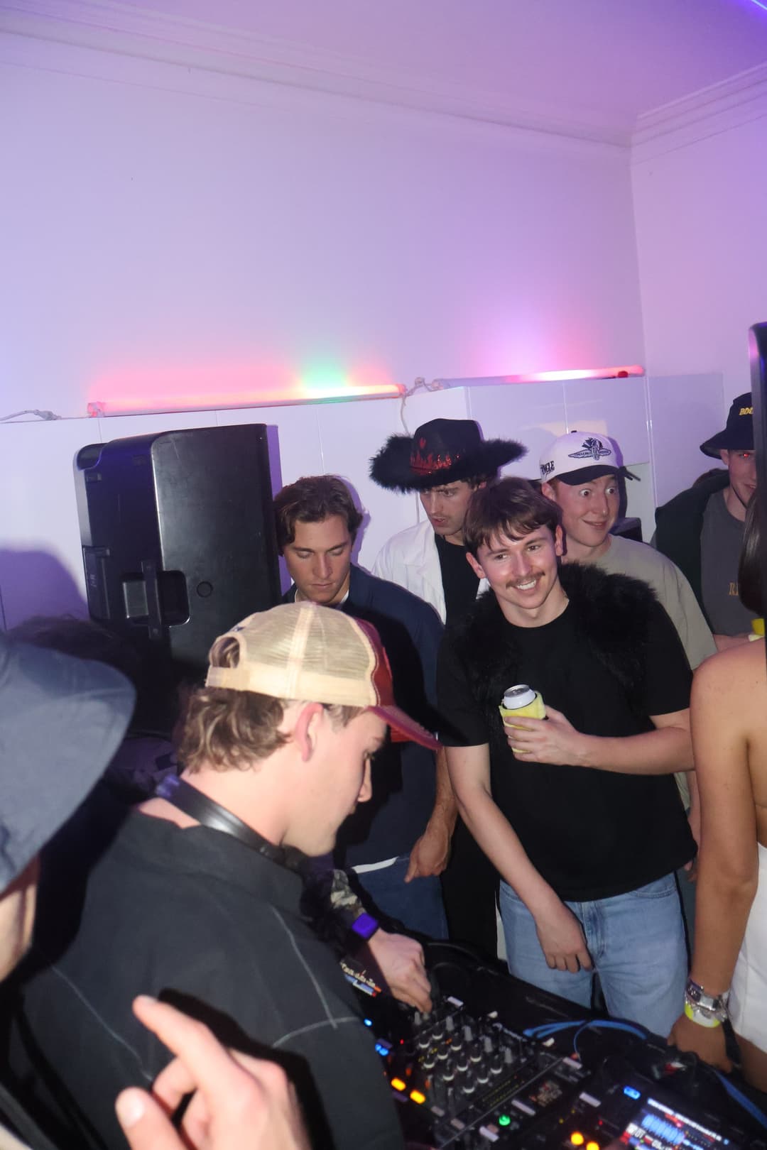 Ben Gerrans on the decks with the party behind him