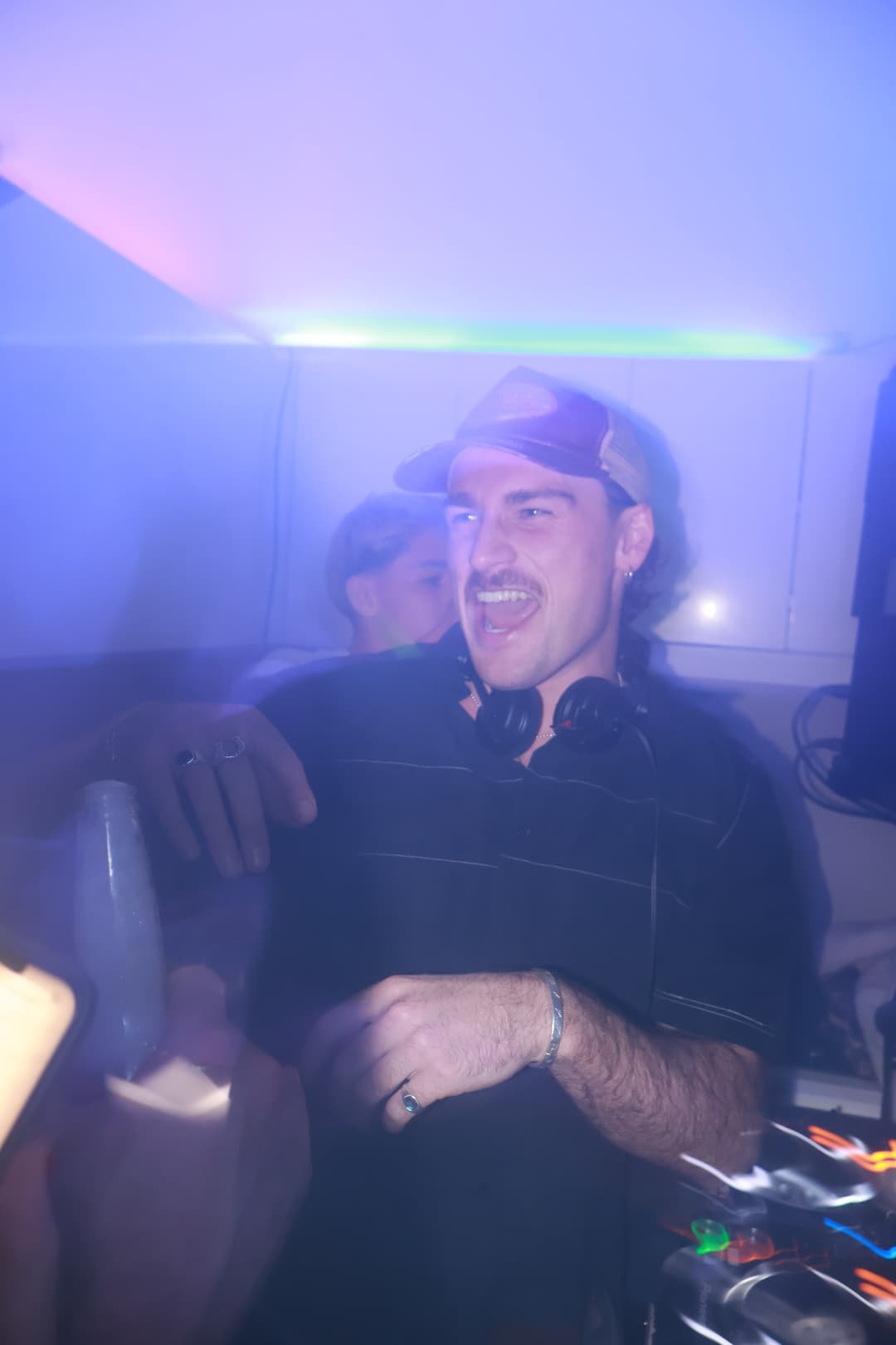 Laughing behind the booth