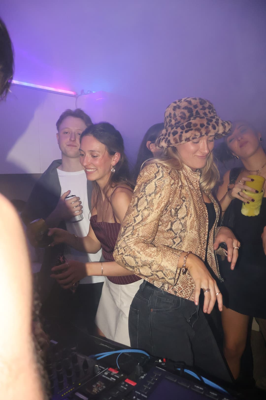 The leopard-print hat on the decks