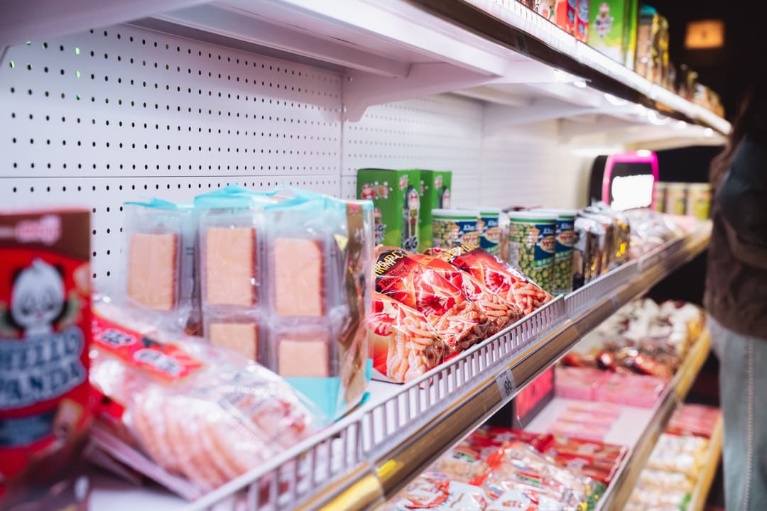 Konbini shelves stocked with Japanese snacks