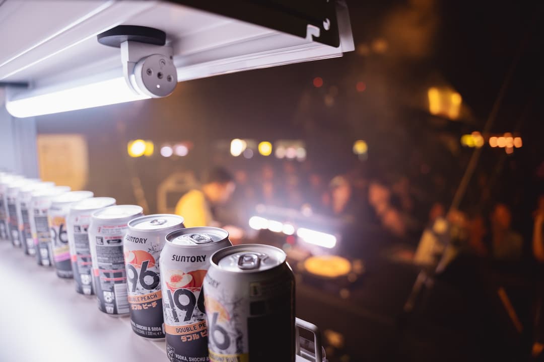 A row of -196 cans lit from above