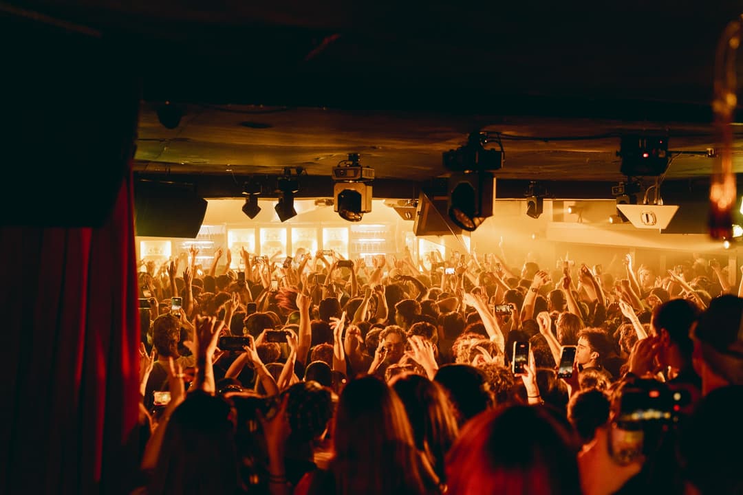 Club Angel on the decks at Carousel with the crowd's hands in the air at the -196 Japanese Convenience Store