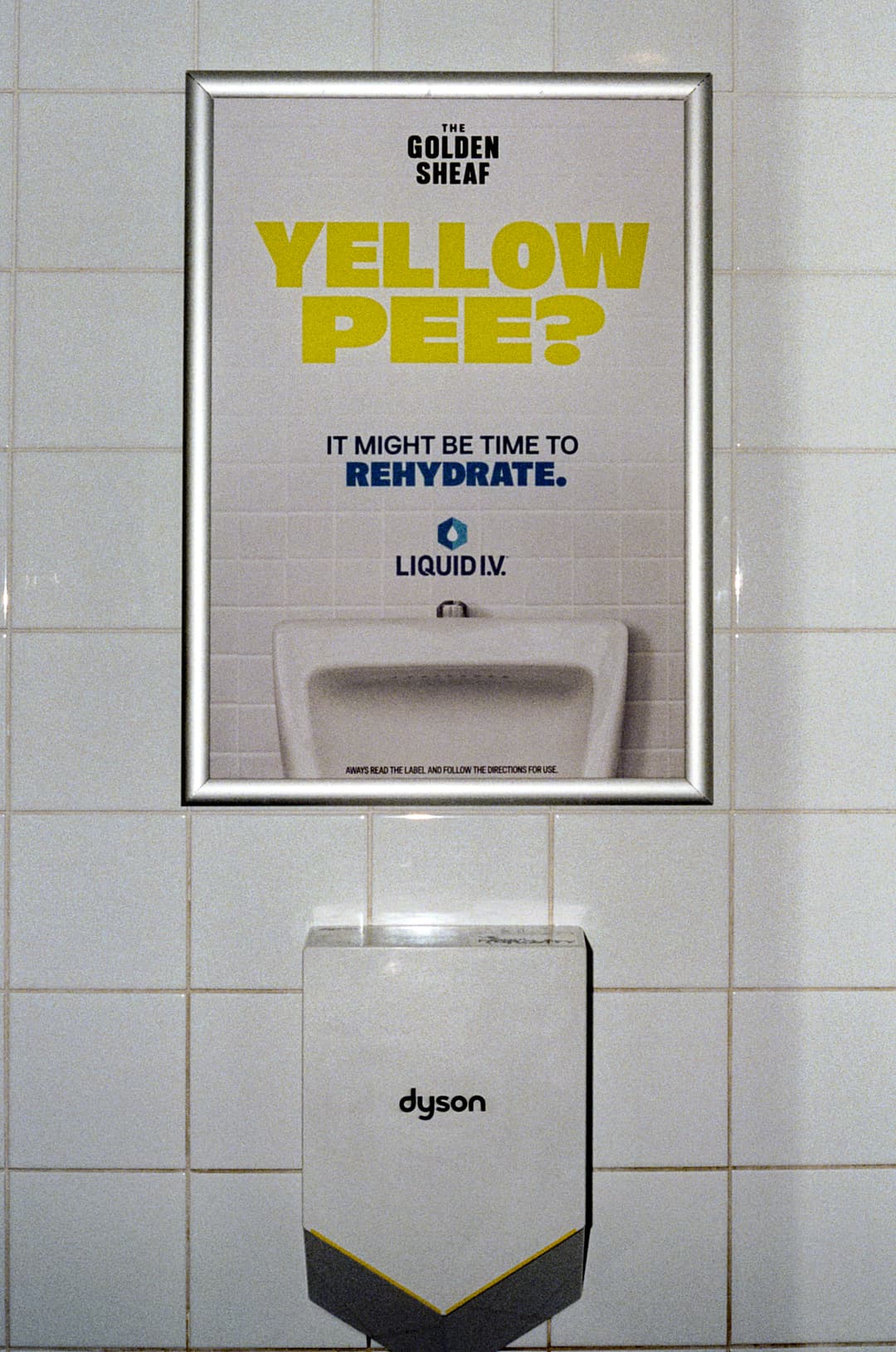 Tongue in cheek Liquid I.V. rehydration poster in the venue toilets